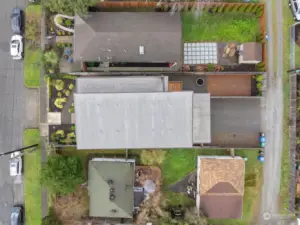 Aerial overhead photo of the home.  Wonderful street with curbs and sidewalks and alley access. Only minutes to Amazon, downtown, the UW and 520.