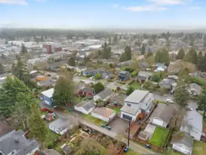 Aerial of the back of the home. You can see Green Lake from this picture. Wonderful street with curbs and sidewalks and alley access. Only minutes to Amazon, downtown, the UW and 520.