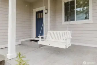 Beautiful Covered Front Porch with relaxation swing!