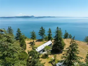 Incredible sunny parcel with expansive water and mountain views.
