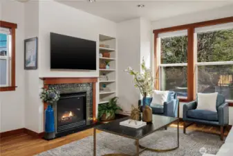 Living room with gas fireplace and built-in shelving