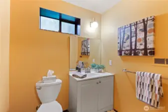 The convenient half bath located downstairs.