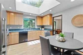 The kitchen is infused with beautiful natural light which is provided by the massive skylight.