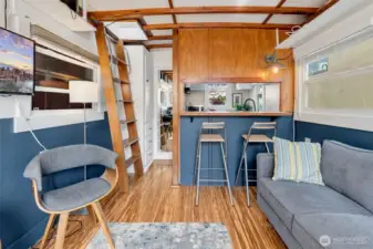 Charming and cozy with wood beamed ceilings and wood floors.