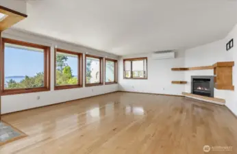 Living room with red oak floors