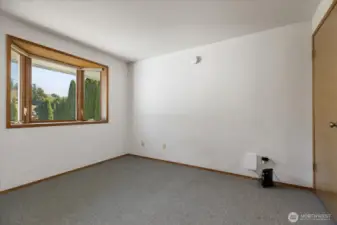 Main floor guest bedroom unstaged.