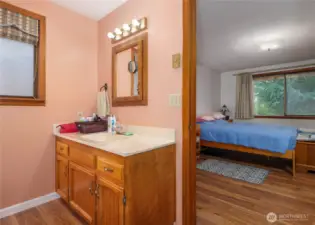 primary bedroom and bath