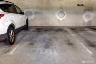 Secure Parking space across from the elevator. Add your own bike rack to the space?