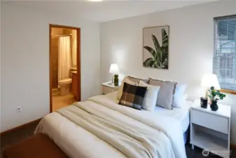 Main bedroom with attached bathroom is spacious and elegant. Bring all your bedroom furniture that you love.