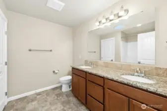 Hallway bathroom with large closet.