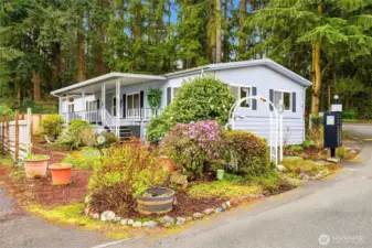 Welcome home — tucked into a quiet, tree-lined setting