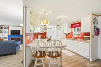 Open layout that connects kitchen + living