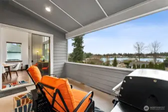 Entertain and BBQ on the upper covered deck with beautiful lake views