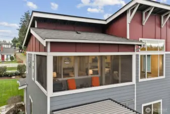 The covered upper deck features retractable screens, allowing it to be fully enclosed.