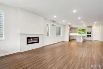 Spacious gathering area with fireplace surround