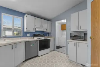 Kitchen has tons of cabinet space - newer dishwasher 2025 - newer fridge all appliances included.