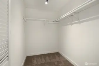 Large primary bedroom walk-in closet