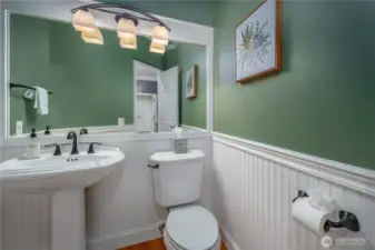 This main-floor powder room is tastefully updated and conveniently located.