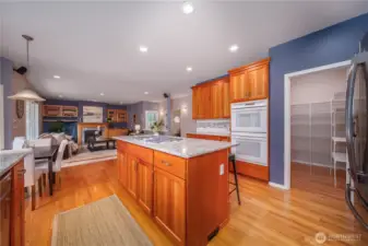 The kitchen offers abundant storage with cabinetry designed to keep everything within reach.