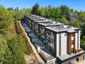 Nestled into the south side of the botanical gardens for privacy.