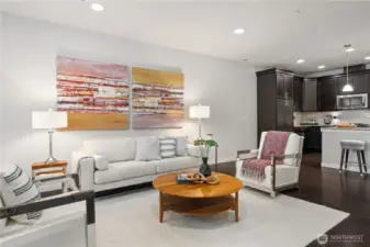 The great room is a perfect entertaining space with living, kitchen and dining rooms all flowing together