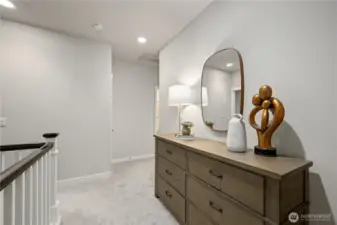 The top of the stairs has a large landing