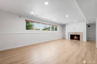 Large windows downstairs and high ceilings let lots of natural ight come in
