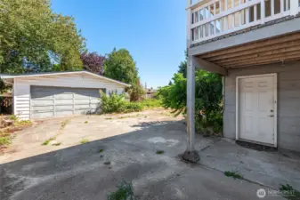 Outside has a generous backyard, perfect for an ADU/DADU.  Also has a 2 car detached garage.