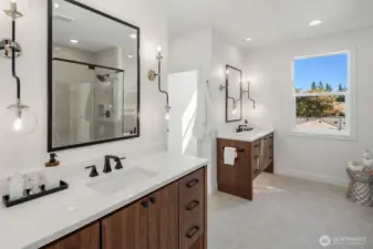Designer primary suite with five-piece bath & heated floors