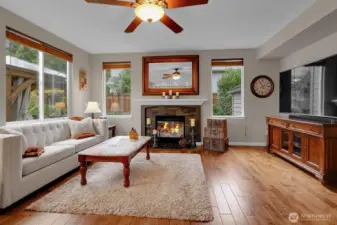 Family room with hardwood floors and gas fireplace