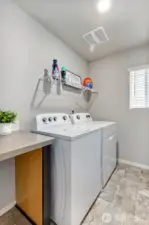 Upstairs laundry room. Washer and dryer included.