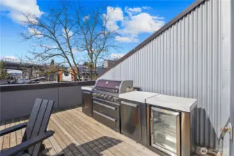Custom built-in grill and wine fridge