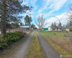 Saying this is an amazing property is an understatement! To the left is the 5 ac field, The home and carport on the right then the 40 acres extends from this roadway
