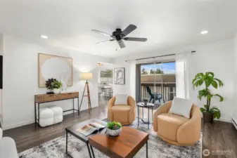 Thoughtful layout, spacious living room with access to private covered deck.