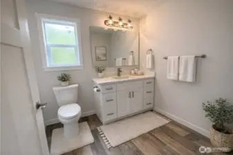 Main Full bath virtually staged, All pictures of previous build to depict features and quality