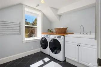 Large laundry room with lots of western sun.