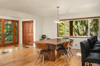 Upon entry, Zebrawood floors complement the main level.