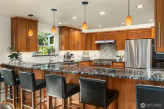 The kitchen was remodeled in 2013 attractive granite counters, an appliance package and amber lighting.