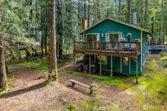 Upper deck and lower patio overlooking backyard.