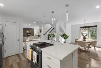 Quartz island and counters with enough room for the most discerning chef.