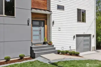 The entryway offers custom wood accents for a Pacific Northwest feel.