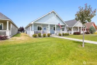You'll just love the Tudor-style porch! Plenty of room for several people to visit out front or just relax with your morning coffee.