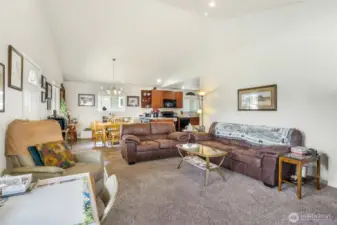 Another view of the living room with all of it's openness and natural light flowing in.