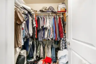 Primary bedroom walk-in closet.