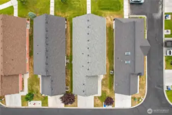 The light gray roof is this home, and you'll see there's extra parking for visitors at the top right, just a home away. More parking is available to the left, near the clubhouse.