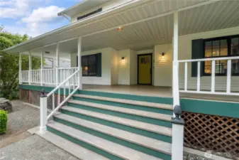 Welcome in to this charming home with wrap around porch