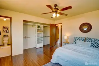 Primary bedroom with closet and bathroom