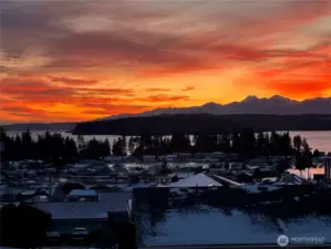 Epic sunsets of canal and Mountains overlooking the marina.