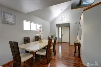 As you step inside, you’ll find a spacious and bright dining room, perfect for family meals.