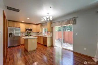 The kitchen is fully equipped with modern appliances and offers plenty of counter and cabinet space — perfect for cooking and hosting.